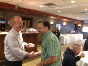 Drew Mencke receiving his 30 year ring
